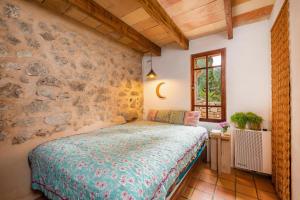 Posteľ alebo postele v izbe v ubytovaní Finca Bona Feina