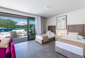Posteľ alebo postele v izbe v ubytovaní Villa Sol del Mar III + 37 fotografií