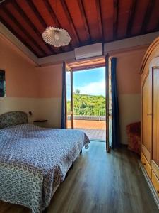 Кровать или кровати в номере Villa Ilangi