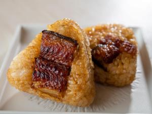 a plate with two pastries with jam on it at ART HOTEL Miyazaki Sky Tower in Miyazaki
