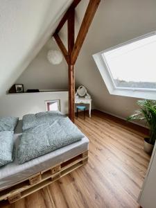 Postel nebo postele na pokoji v ubytování Ferienhaus mit 5* Luxus im Schwarzwald