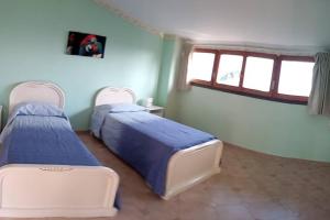 Llit o llits en una habitació de Collina Belvedere, appartamento indipendente in villa Salerno-Capezzano