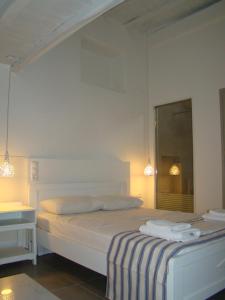 Posteľ alebo postele v izbe v ubytovaní Efi's Apartments