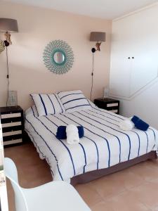 Ένα ή περισσότερα κρεβάτια σε δωμάτιο στο RESIDENCE NUEVO HORIZONTE +55 φωτογραφίες