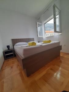 Postel nebo postele na pokoji v ubytování Apartment Luce