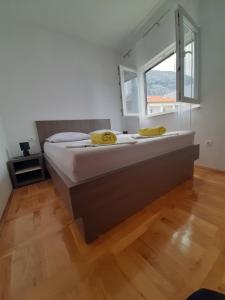 Postel nebo postele na pokoji v ubytování Apartment Luce