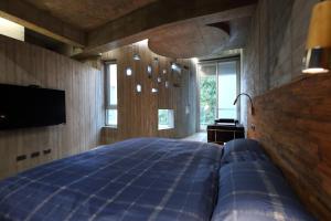 Letto o letti in una camera di Penlai Home