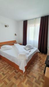 Postel nebo postele na pokoji v ubytování Casa Sunshine