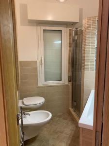 Koupelna v ubytování Residenza Casa del Sole Appartamento + 16 fotografií