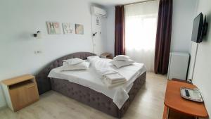 Postel nebo postele na pokoji v ubytování Casa Sunshine