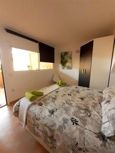 Ένα ή περισσότερα κρεβάτια σε δωμάτιο στο RESIDENCE NUEVO HORIZONTE