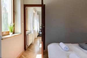 Posteľ alebo postele v izbe v ubytovaní udanypobyt Apartament z Basenem
