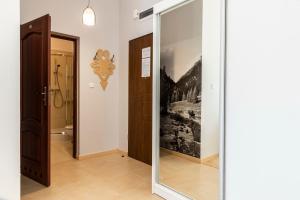 Kúpeľňa v ubytovaní udanypobyt Apartament z Basenem