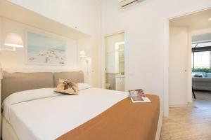A bed or beds in a room at Amazing Penthouse Piazza Venezia