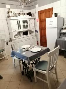 A kitchen or kitchenette at Vidéki Porta