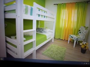 Postel nebo postele na pokoji v ubytování Apartman Miranda