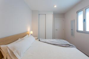 Posteľ alebo postele v izbe v ubytovaní Apartamento Las Canteras Beachway