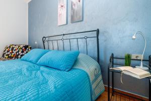 Кровать или кровати в номере Cuvi Beach Apartments