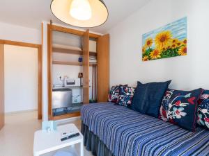 Кровать или кровати в номере Apartamento LABORT