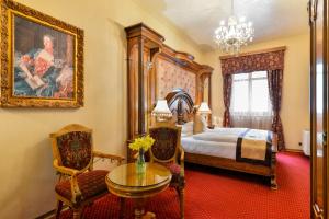 Postel nebo postele na pokoji v ubytování Premier Prezident Garni Hotel and Spa