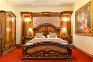Postel nebo postele na pokoji v ubytování Premier Prezident Garni Hotel and Spa