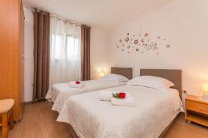 Posteľ alebo postele v izbe v ubytovaní Villa Sali ZadarVillas
