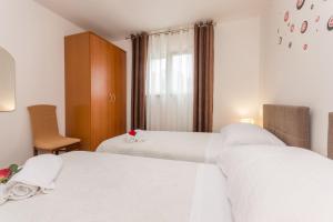 Posteľ alebo postele v izbe v ubytovaní Villa Sali ZadarVillas