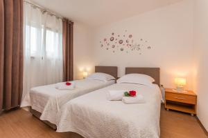 Posteľ alebo postele v izbe v ubytovaní Villa Sali ZadarVillas