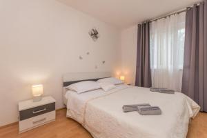 Posteľ alebo postele v izbe v ubytovaní Villa Sali ZadarVillas