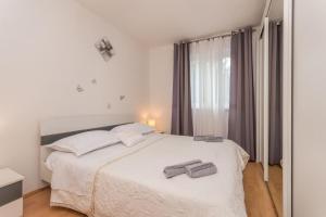 Posteľ alebo postele v izbe v ubytovaní Villa Sali ZadarVillas