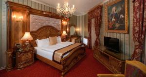 Postel nebo postele na pokoji v ubytování Premier Prezident Garni Hotel and Spa