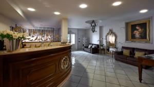 Lobbyn eller receptionsområdet på Hotel Villa Poseidon & Events