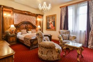 Postel nebo postele na pokoji v ubytování Premier Prezident Garni Hotel and Spa