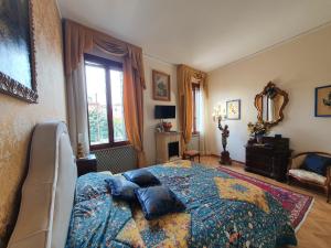 Postel nebo postele na pokoji v ubytování B&B Beroni a Venezia