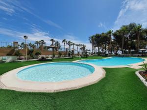 Bazén v ubytovaní Apartamento Acapulco Holiday alebo v jeho blízkosti