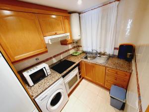 Kuchyňa alebo kuchynka v ubytovaní Apartamento Acapulco Holiday