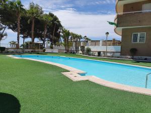 Bazén v ubytovaní Apartamento Acapulco Holiday alebo v jeho blízkosti