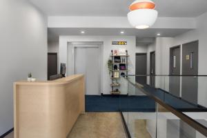 an office with a lobby with a reception desk at The Baltic Hotel in Brooklyn