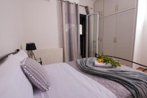 Postel nebo postele na pokoji v ubytování Liovore Apartments
