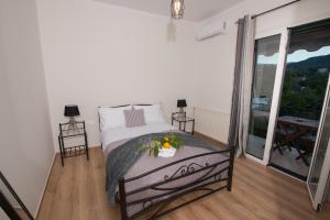 Postel nebo postele na pokoji v ubytování Liovore Apartments