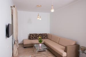 TV a/nebo společenská místnost v ubytování Liovore Apartments