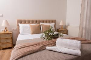 Postel nebo postele na pokoji v ubytování Liovore Apartments