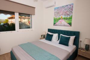 Postel nebo postele na pokoji v ubytování Liovore Apartments
