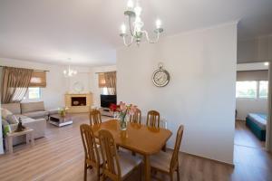 TV a/nebo společenská místnost v ubytování Liovore Apartments