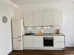 Kuchyň nebo kuchyňský kout v ubytování Weingut-Aparthotel Olinger