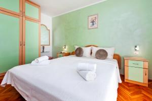 Ein Bett oder Betten in einem Zimmer der Unterkunft Villa Allegria