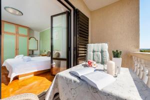 Ein Bett oder Betten in einem Zimmer der Unterkunft Villa Allegria