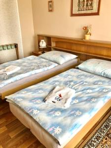 Кровать или кровати в номере Vila Adéla - Teplice