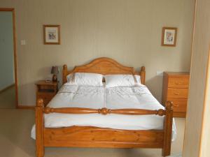 Postel nebo postele na pokoji v ubytování West Point B&B