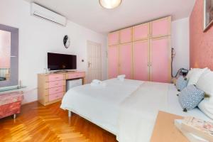 Ein Bett oder Betten in einem Zimmer der Unterkunft Villa Allegria